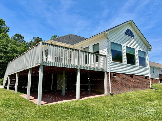 2547 Bill Thompson Rd, Lancaster, SC 29720 - back of property featuring a wooden deck, a yard, a patio area, crawl space, and a shingled roof
