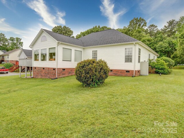 2547 Bill Thompson Rd, Lancaster, SC 29720 - view of side of home with crawl space and a yard