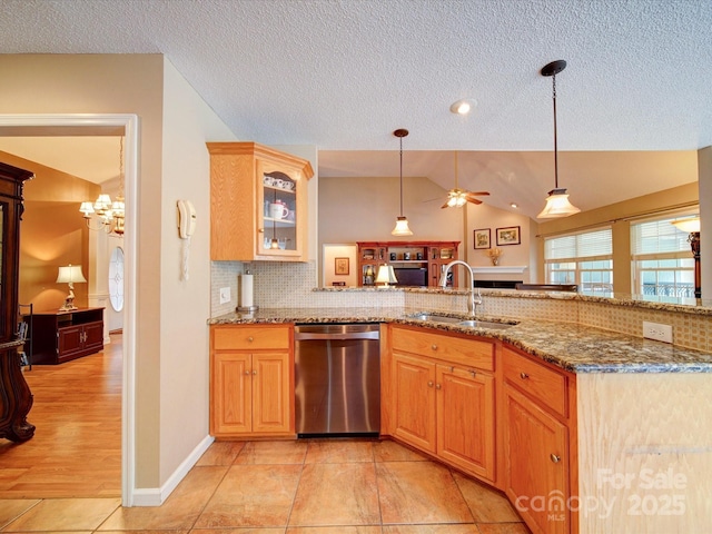 2547 Bill Thompson Rd, Lancaster, SC 29720 - kitchen featuring dishwasher, a sink, a textured ceiling, decorative backsplash, and lofted ceiling