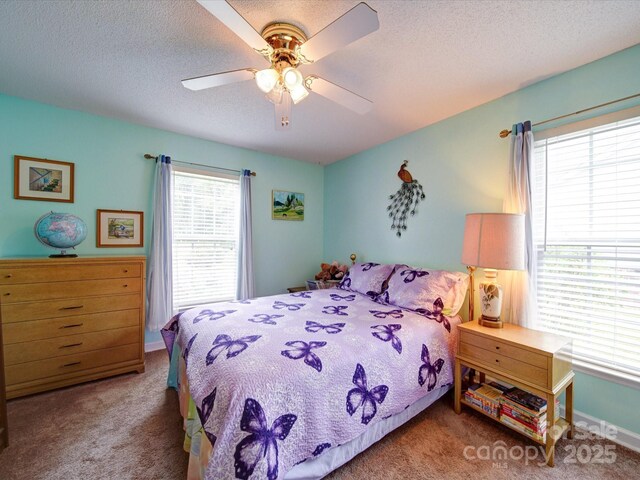 2547 Bill Thompson Rd, Lancaster, SC 29720 - carpeted bedroom featuring ceiling fan and a textured ceiling
