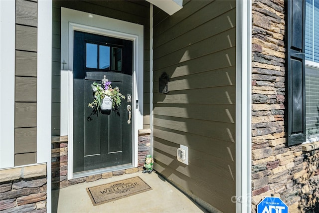 70 Cameo Dr, Flat Rock, NC 28731 - doorway to property featuring stone siding