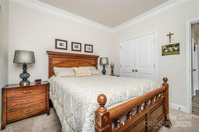 70 Cameo Dr, Flat Rock, NC 28731 - carpeted bedroom with a closet, crown molding, and baseboards
