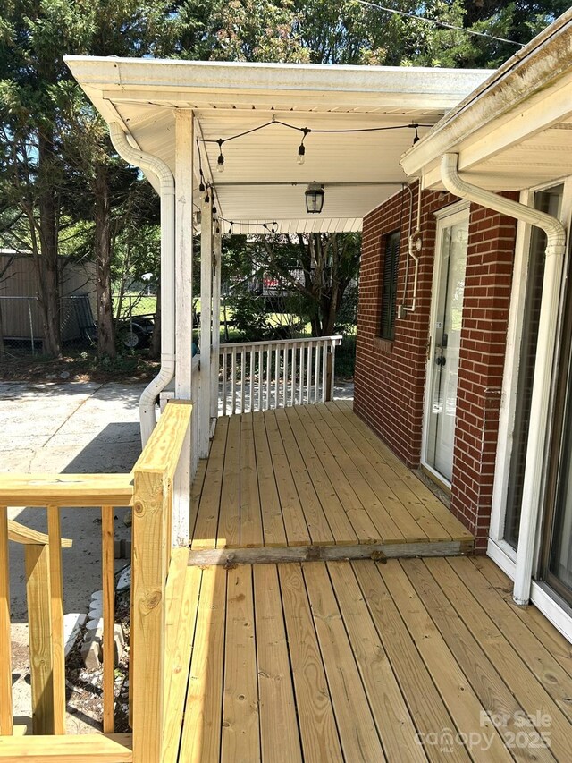 deck featuring covered porch