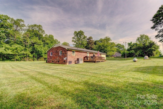 view of yard featuring a deck