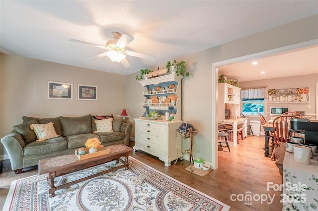 4805 Nesbit Rd, Monroe, NC 28112 - living area with a ceiling fan, baseboards, recessed lighting, and wood finished floors