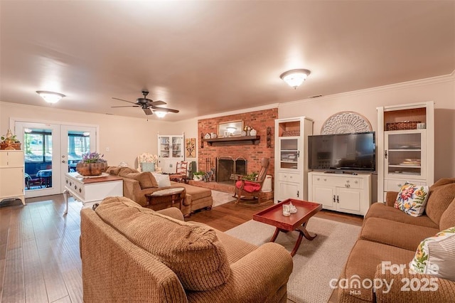 4805 Nesbit Rd, Monroe, NC 28112 - living room featuring a ceiling fan, ornamental molding, wood finished floors, and a fireplace