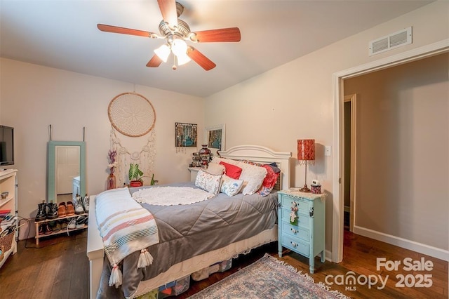 4805 Nesbit Rd, Monroe, NC 28112 - bedroom featuring baseboards, ceiling fan, dark wood finished floors, and visible vents