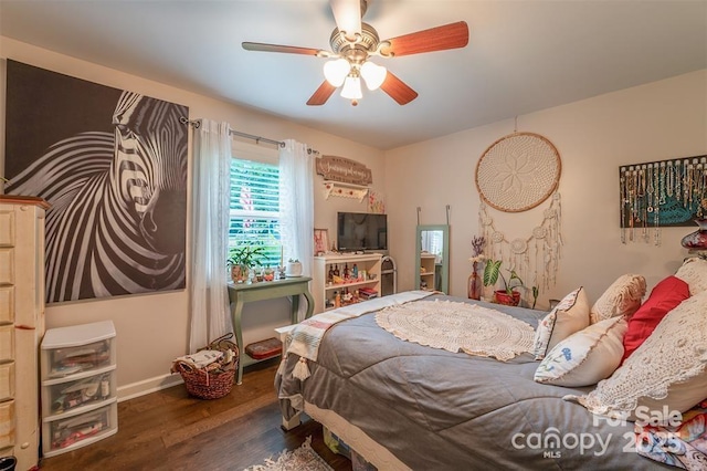 4805 Nesbit Rd, Monroe, NC 28112 - bedroom with baseboards, ceiling fan, and wood finished floors