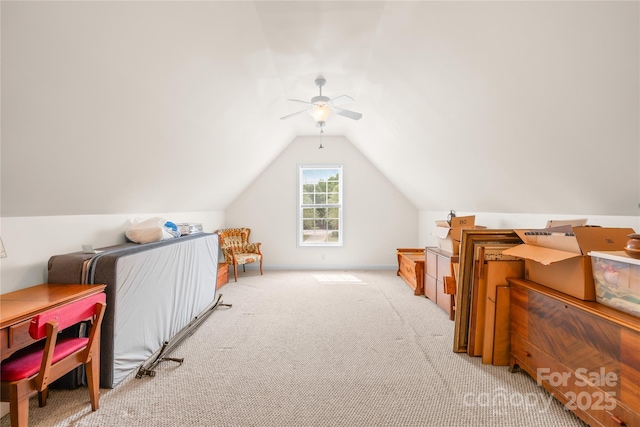 bonus room with ceiling fan, vaulted ceiling, and light colored carpet