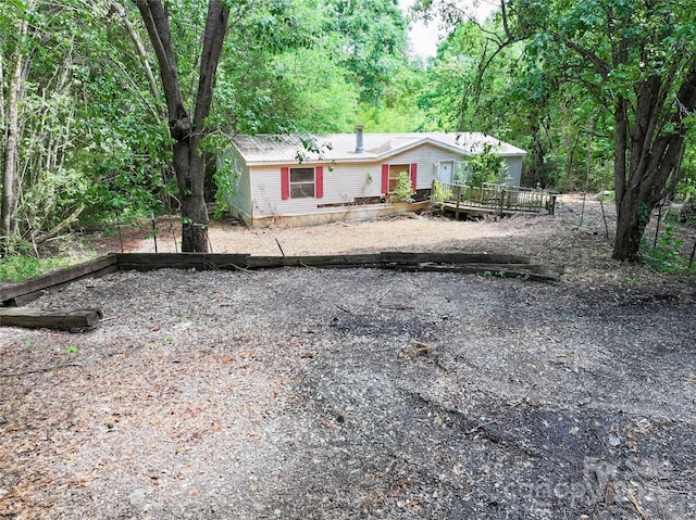 4585 Sunrise Beach Rd, Catawba, NC 28609 - view of front of property with a deck and a wooded view