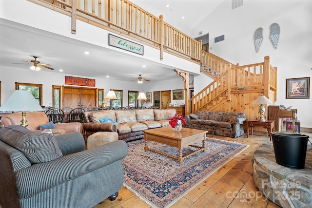 living room with recessed lighting, ceiling fan, and plenty of natural light