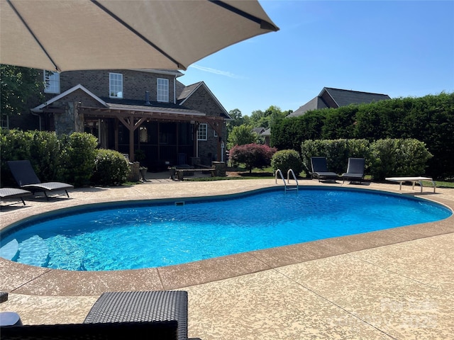 3000 J R Ct, Stanley, NC 28164 - outdoor pool with a diving board and a patio area