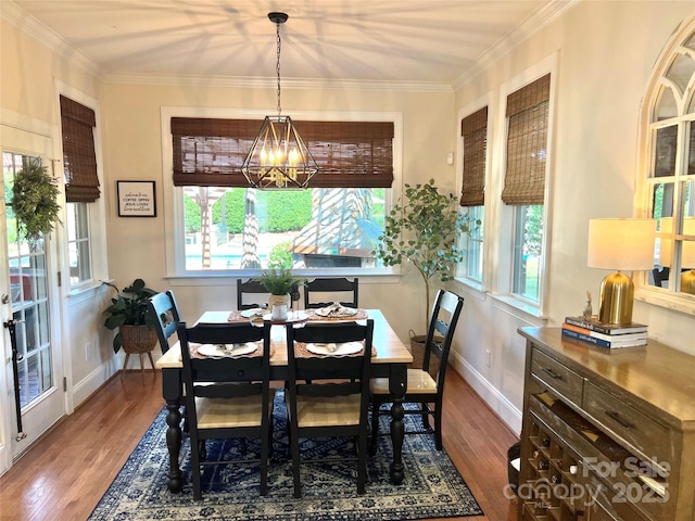 3000 J R Ct, Stanley, NC 28164 - dining space with wood finished floors, a chandelier, and a wealth of natural light