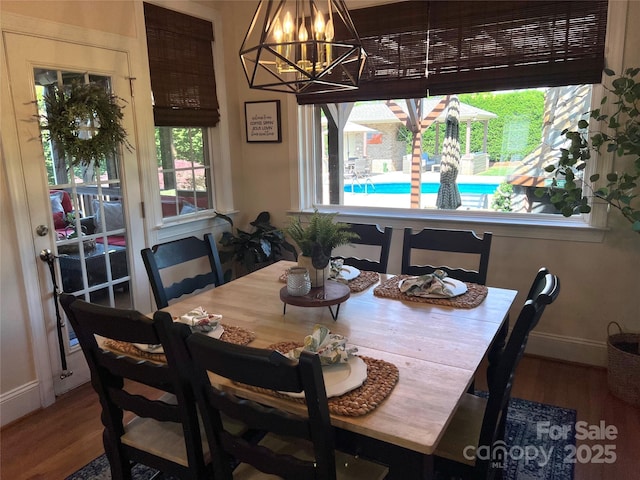 3000 J R Ct, Stanley, NC 28164 - dining area with plenty of natural light, baseboards, and wood finished floors