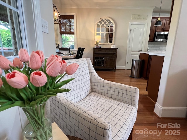 3000 J R Ct, Stanley, NC 28164 - sitting room with crown molding, baseboards, and dark wood-style floors