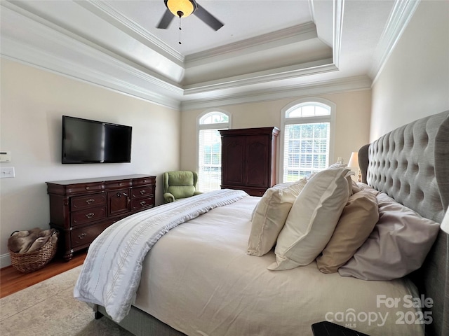 3000 J R Ct, Stanley, NC 28164 - bedroom with crown molding, a ceiling fan, wood finished floors, and a raised ceiling