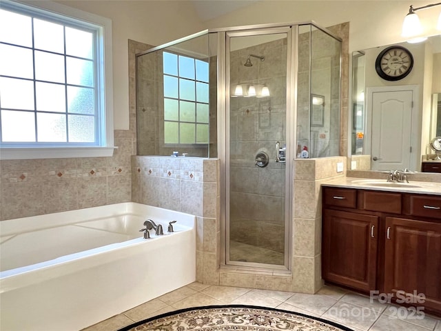 3000 J R Ct, Stanley, NC 28164 - full bath featuring a garden tub, tile walls, a shower stall, vanity, and tile patterned floors