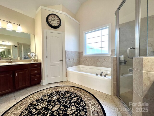 3000 J R Ct, Stanley, NC 28164 - full bath with tile patterned floors, a shower stall, and a bath