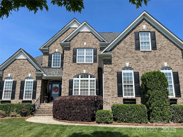 3000 J R Ct, Stanley, NC 28164 - view of front of house featuring brick siding and roof with shingles