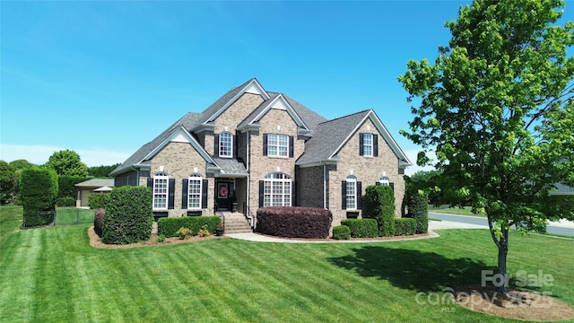 3000 J R Ct, Stanley, NC 28164 - craftsman inspired home with brick siding and a front lawn