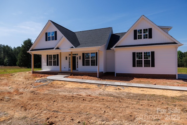modern farmhouse style home featuring a porch