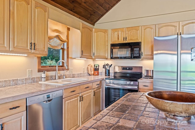 kitchen featuring light brown cabinetry, wood ceiling, appliances with stainless steel finishes, and a sink