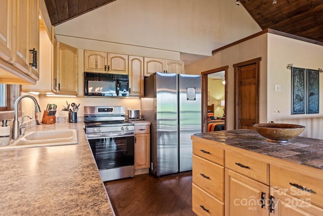 kitchen with a sink, wood ceiling, appliances with stainless steel finishes, and light brown cabinetry