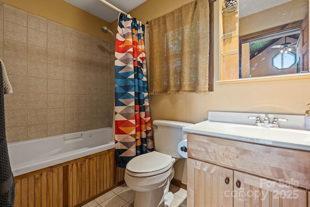 full bath featuring vanity, tile patterned floors, shower / bath combo, and toilet