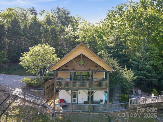 chalet / cabin featuring fence