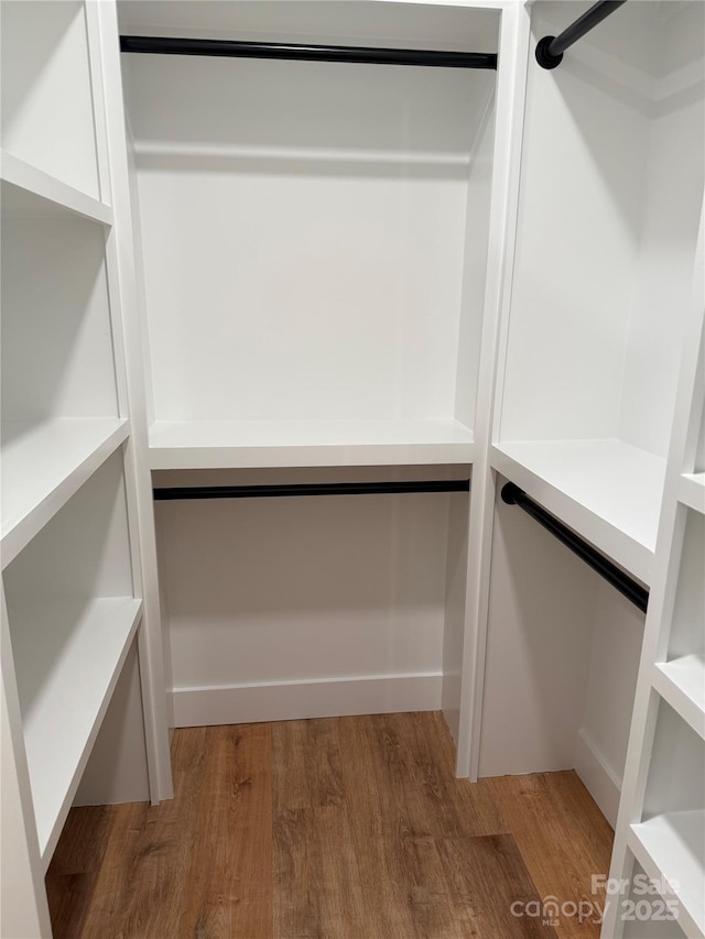 15 Woodchuck Cv, Alexander, NC 28701 - walk in closet featuring wood finished floors