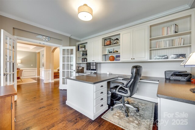 308 Hollister Estates Dr, Waxhaw, NC 28173 - office space with french doors, ornamental molding, arched walkways, built in study area, and wainscoting
