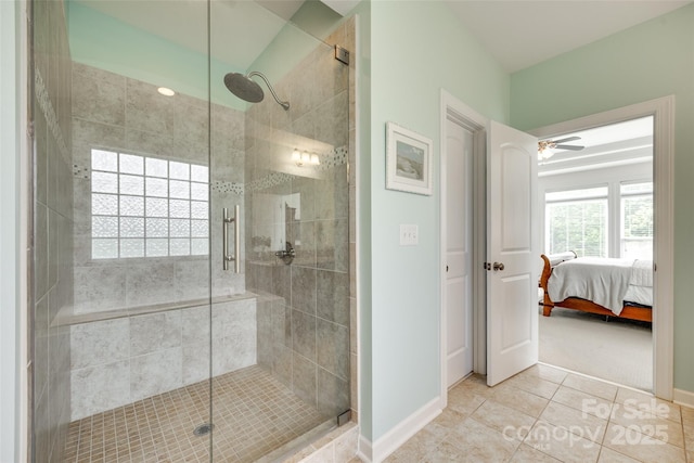 308 Hollister Estates Dr, Waxhaw, NC 28173 - full bath with a shower stall, tile patterned floors, baseboards, connected bathroom, and ceiling fan