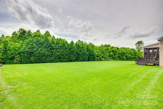 308 Hollister Estates Dr, Waxhaw, NC 28173 - view of green lawn featuring a wooden deck