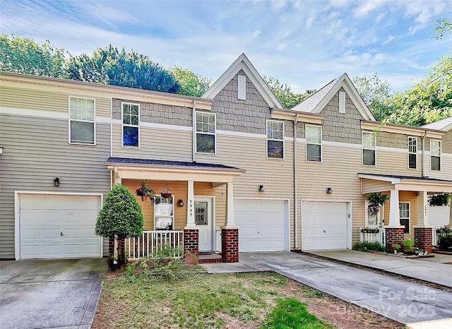 5943 Pisgah Way, Charlotte, NC 28217 - view of front of property featuring an attached garage, driveway, and covered porch
