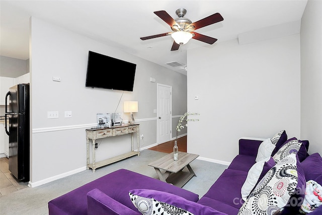 5943 Pisgah Way, Charlotte, NC 28217 - living area with baseboards, ceiling fan, light carpet, and visible vents