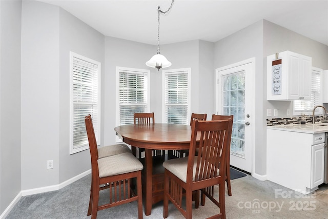 5943 Pisgah Way, Charlotte, NC 28217 - dining area featuring baseboards and light carpet