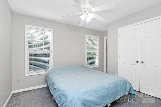 5943 Pisgah Way, Charlotte, NC 28217 - carpeted bedroom with a ceiling fan, baseboards, and a closet
