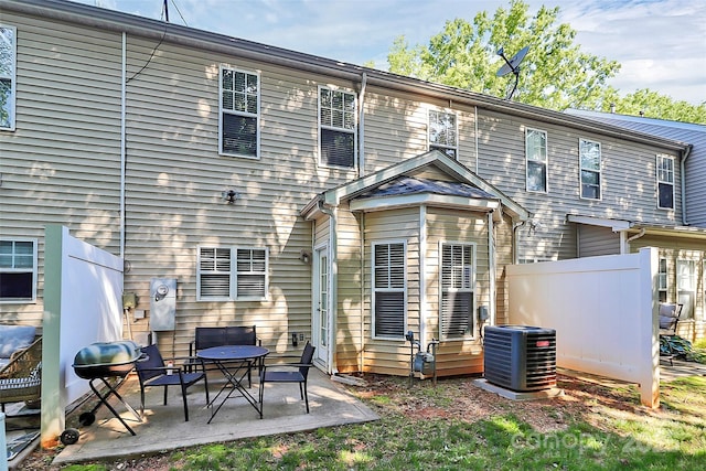 5943 Pisgah Way, Charlotte, NC 28217 - rear view of house featuring central air condition unit, fence, and a patio area