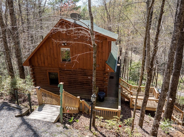 view of outdoor structure featuring a wooded view