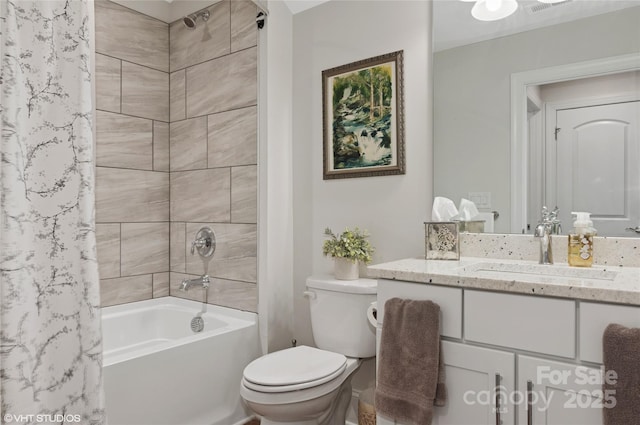 bathroom featuring vanity, shower / bathtub combination with curtain, and toilet