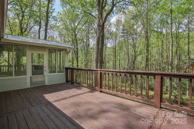wooden terrace with a sunroom