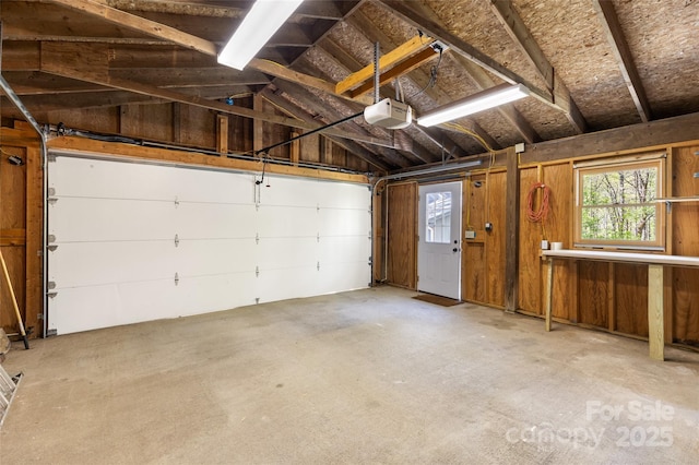 garage featuring a garage door opener