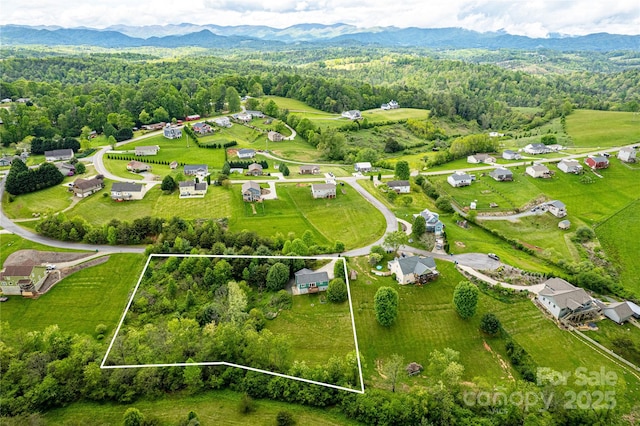 18 Benzington Way, Leicester, NC 28748 - aerial overview of property's location with property parcel outlined and mountains