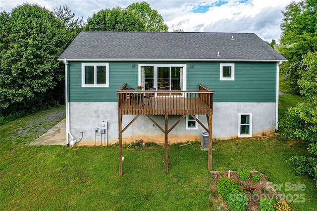 18 Benzington Way, Leicester, NC 28748 - back of house featuring a wooden deck, a yard, central AC unit, and roof with shingles
