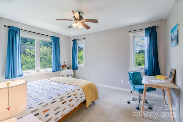 18 Benzington Way, Leicester, NC 28748 - bedroom featuring multiple windows, baseboards, carpet flooring, and a ceiling fan