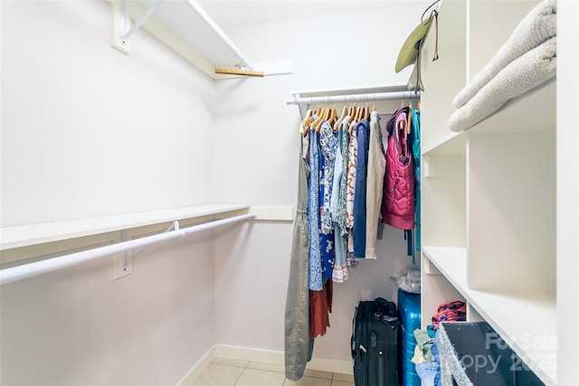 18 Benzington Way, Leicester, NC 28748 - walk in closet featuring light tile patterned flooring