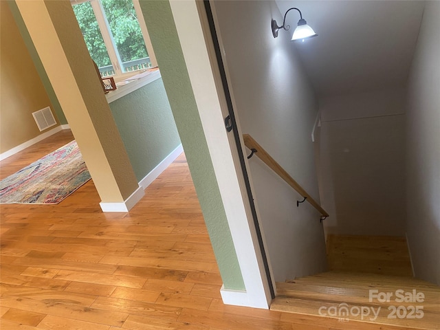 18 Benzington Way, Leicester, NC 28748 - staircase with hardwood / wood-style flooring, baseboards, and a textured wall