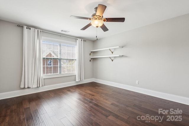 907 Ospre Ln, Fort Mill, SC 29708 - unfurnished room with visible vents, baseboards, ceiling fan, and dark wood-style floors