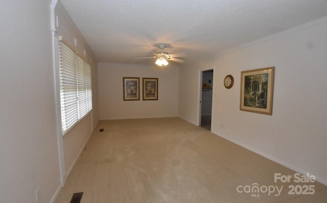 902 Church St NW, Valdese, NC 28690 - unfurnished room featuring ceiling fan, light carpet, and visible vents