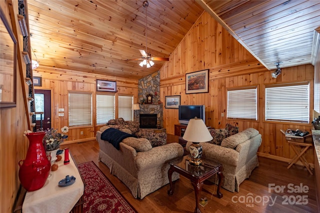 1053 Rich Hill Mountain Rd, Glade Valley, NC 28627 - living area with wood walls, plenty of natural light, wood ceiling, and a fireplace